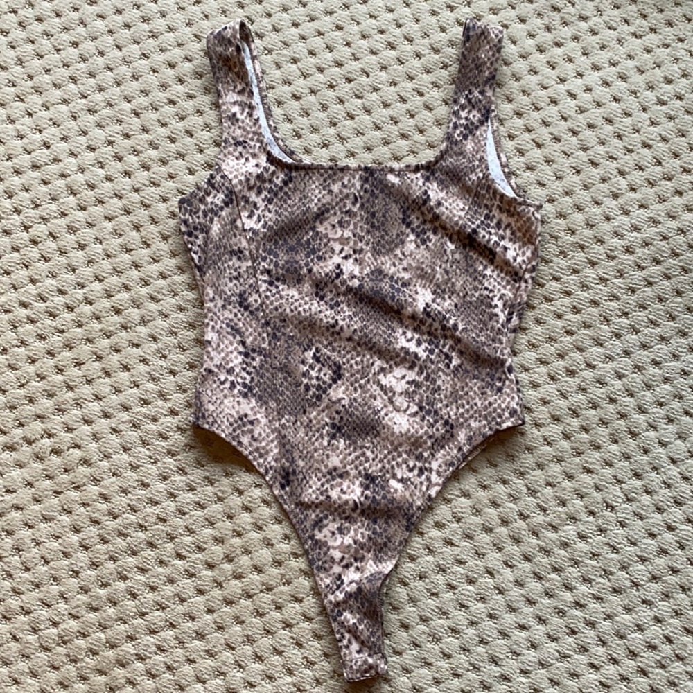 Kittenish snakeskin bodysuit